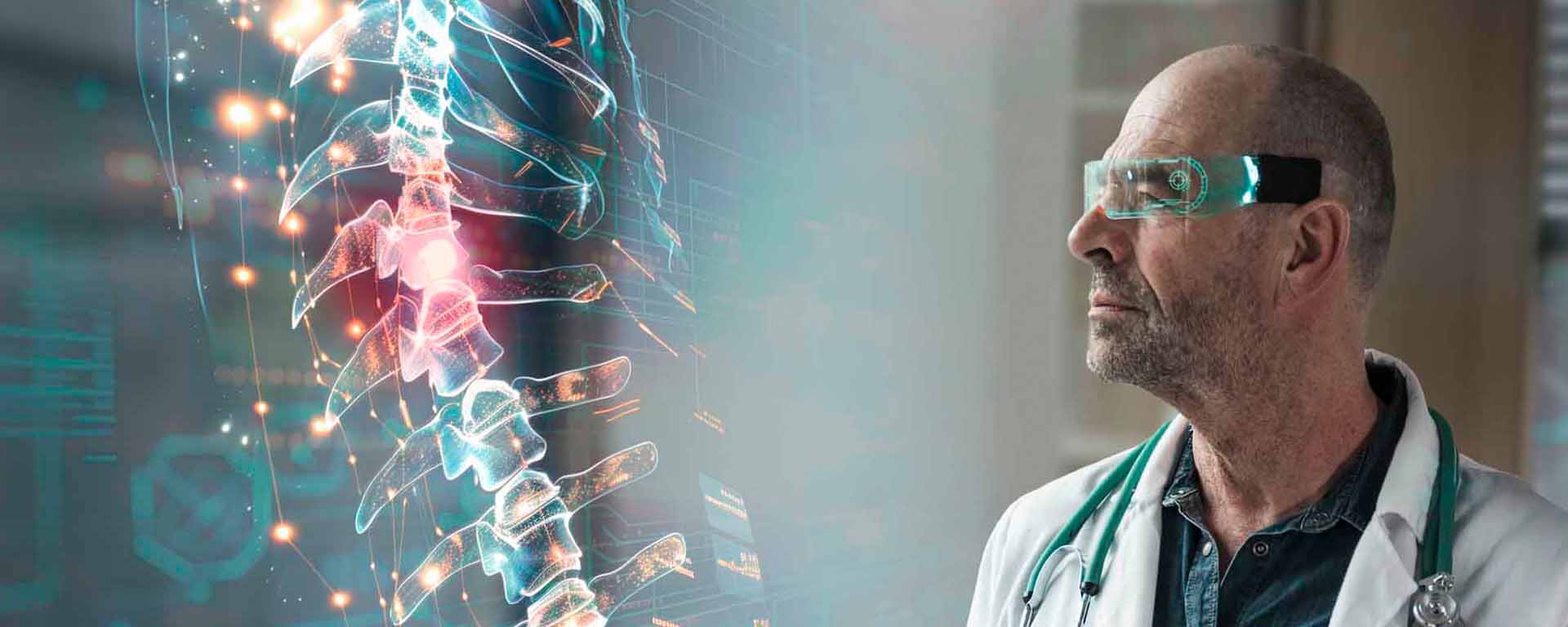 Doctor looking at holographic spinal image