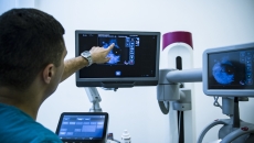 Imaging specialist reviewing a scan