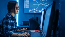 Person reviewing data on a PC