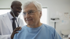 Healthcare professional examining a patient 