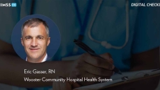 Eric Gasser, Wooster Community Hospital Health System_Nurse checkng patient's chart Photo by ljubaphoto/E+/Getty Images