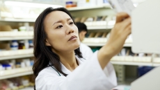 Pharmacist conducting inventory