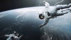Astronauts floating in space