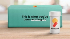 A 9am.health box and medication bottle