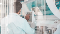 Technician reviewing data