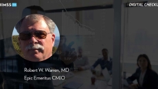 Dr. Robert W. Warren, Epic_Business meeting with interactive screen Photo by Hispanolistic/E+/Getty Images