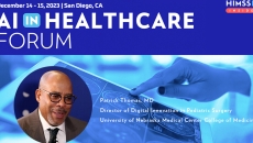 Dr. Patrick Thomas at the UNMC College of Medicine_Doctor looking at brain scan on tablet photo by katleho Seisa/Getty Images