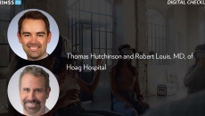 Thomas Hutchinson and Dr. Robert Louis at Hoag Hospital_Group wearing VR glasses by FilippoBacci/Getty Images