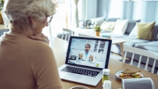 Person having an interactive conversation with a healthcare professional