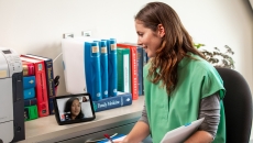 A provider talks to a patient using an Alexa-enabled device