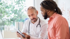 A man talking to his primary care provider