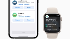 An Apple Watch and an iPhone displaying the medication tracking feature