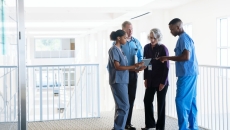 Healthcare providers standing in a circle