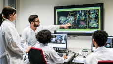 Healthcare providers looking at a diagnostic image