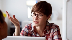 Person looking at open laptop