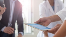 Hospital management signing a contract