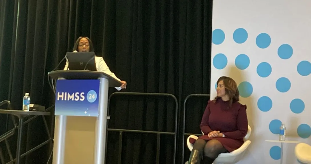 two people presenting a topic