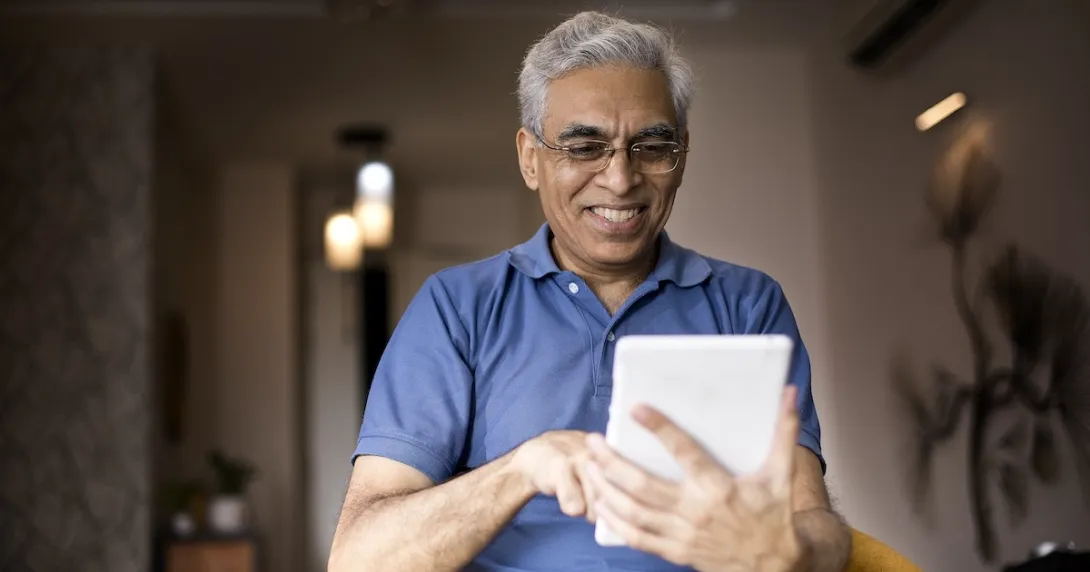 Man looking at tablet computer