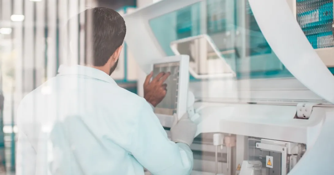 Technician reviewing data