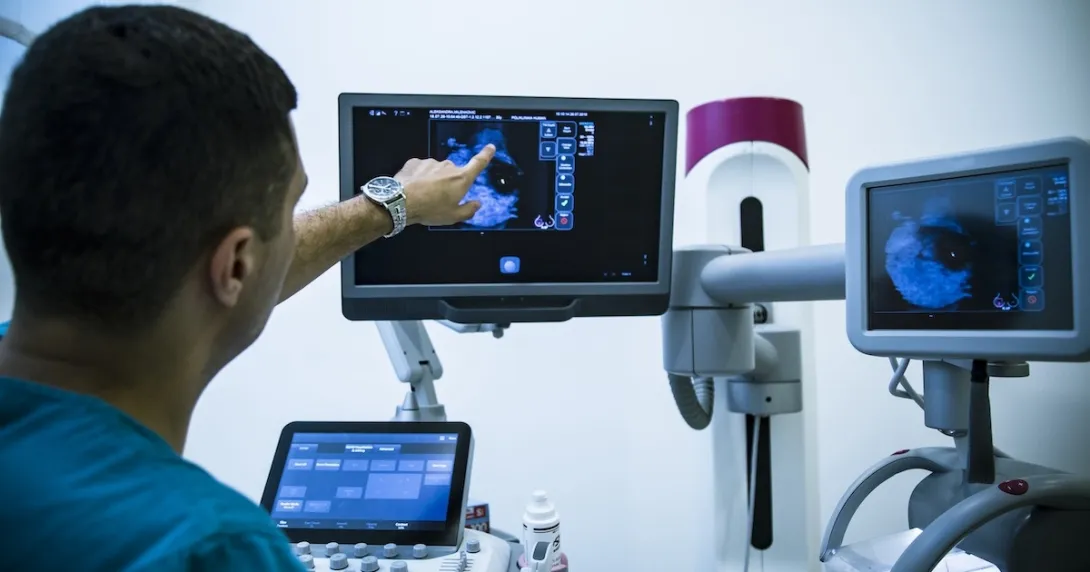 Healthcare professional looking at an image