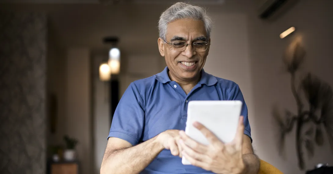 Older man using a tablet