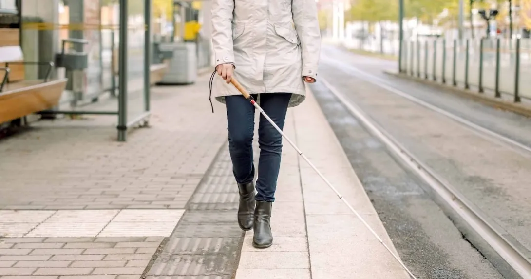 Person walking with a cane