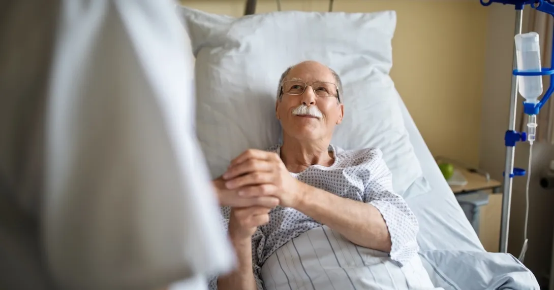 Healthcare professional consulting with patient in the hospital