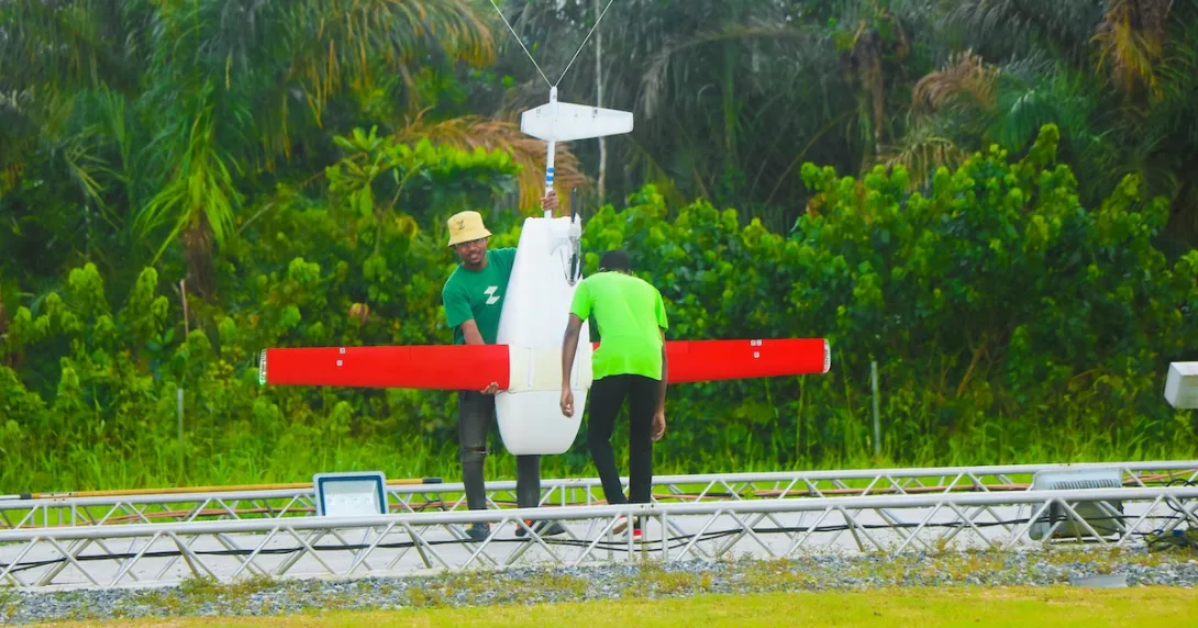 Two individuals preparing a done