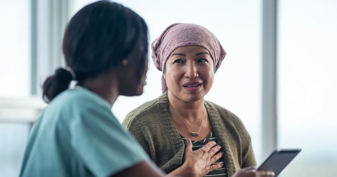 A cancer patient talking to a provider.