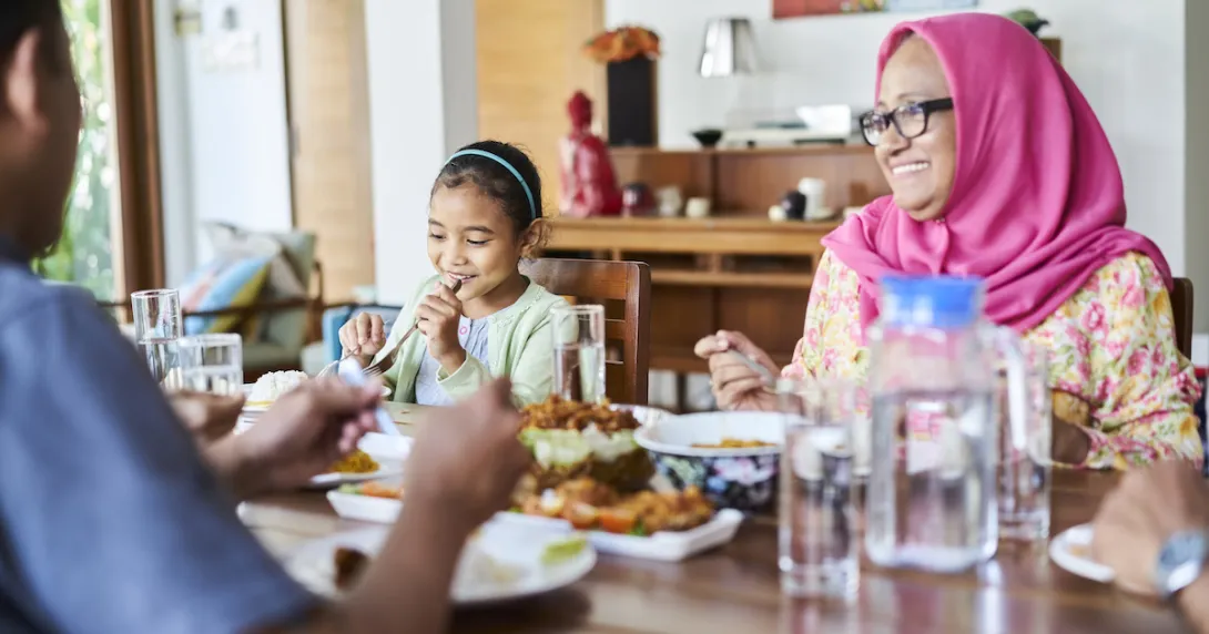A family eating a meal together.