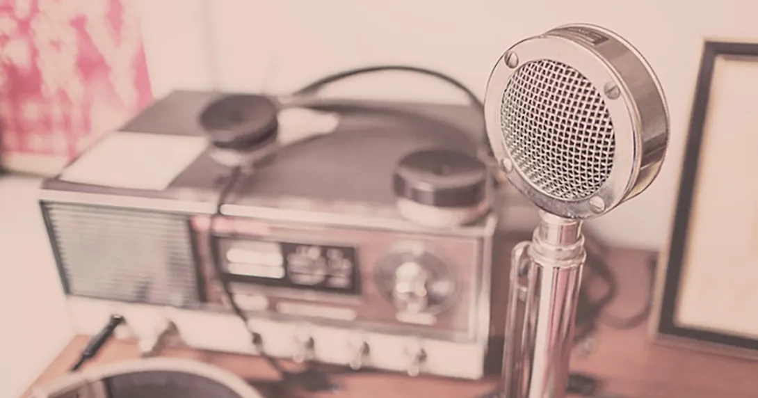 An old-timey microphone and radio setup represent our weekly digital health podcast