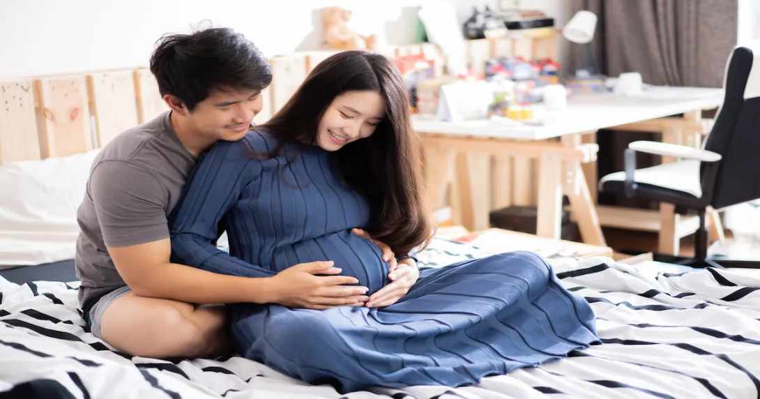 A pregnant woman and her partner