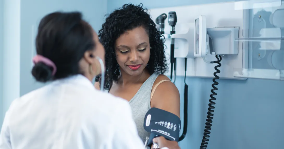 A person getting a blood pressure check during a medical appointment